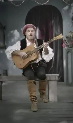 Owain Phyfe plays for an audience at a Renaissance fair in 2003