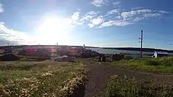 The Church in Tsiigehtchic with the Arctic Red River and Mackenzie River in the background