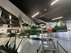 replica of the Mitsubishi F1M in the museum's antenna