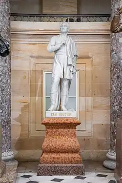 Marble statue of Sam Houston on a stone pedestal