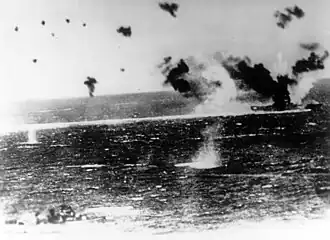 Aircraft carrier USS&nbsp;Lexington under heavy air attack during the Battle of the Coral Sea, the first carrier-versus-carrier battle in history.