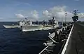 John Lenthall next to the cruiser Normandy, 22 June 2002