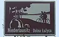 Bilingual information board on the A13
