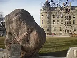 Granite boulder on the front lawn