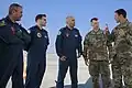 A U.S. Army colonel speaks with Turkish coalition partners during Defender 23