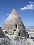 A house carved out of fairy chimney