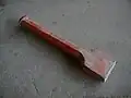 Pitching tool used in preliminary rough shaping blocks of stone