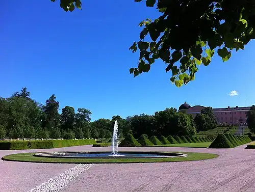 Baroque garden with Uppsala Castle in background