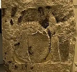 Detail of the reverse side of the Ur-Namma stele: two drummers with a big round drum, during festivities celebrating the building of a temple. Penn Museum.