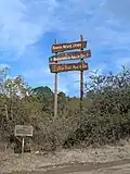 Sign at the entrance to the urban natural reserve in Agua de Oro, Córdoba, Argentina