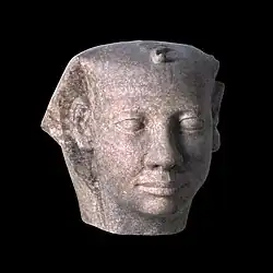 A copy in the University of Lausanne of a head of a colossal statue of Userkaf, found near his pyramid at Saqqara. The original statue head is in the Egyptian Museum in Cairo (JE 52501)