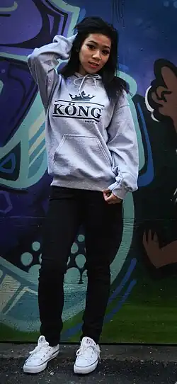 Image 136Vancouver woman in early athleisure look with casual hoodie and white sneakers, 2014. (from 2010s in fashion)