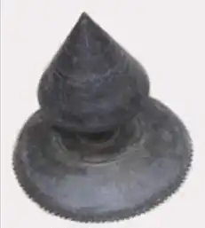 Upper metal part of an ancient Varun (Tupi) Japi known as Sula used during the rule of Sutiya kings kept in the Gharmora Satra.