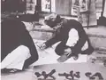 Vietnamese in the Nguyễn Dynasty practicing calligraphy.
