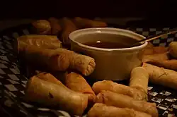Image 41Spring rolls are a large variety of filled, rolled appetizers or dim sum found in Chinese cuisine. Spring rolls are the main dishes in Chinese Spring Festival (Chinese New Year). (from Chinese culture)