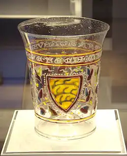 Aldrevandini beaker, a Venetian glass with enamel decoration derived from Islamic technique and style. c. 1330.[36]