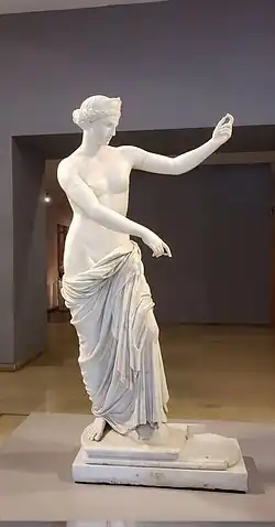 Venus of Capua lifesize sculpture pointing downward with her right hand and left hand rise