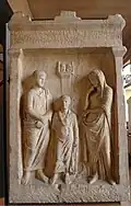 Funerary monument to an actor family of Gaios Silios Bathyllos. On display at Museum-Lapidarium of Maffei.