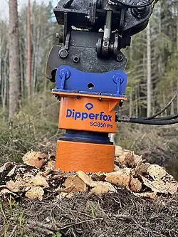 Vertical Stump Grinder Removing Stumps in the Forest. Dipperfox SC 850 Pro