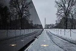 Wall of black granite engraved with names