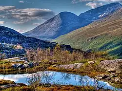 A small mountain pond with surrounding fells near Bárrás.