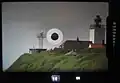 Camera viewfinder with 300&nbsp;mm telephoto lens and 2x teleconverter.