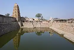 Sacred stepwell and temple tank located at the Virupaksha Temple site, Hampi