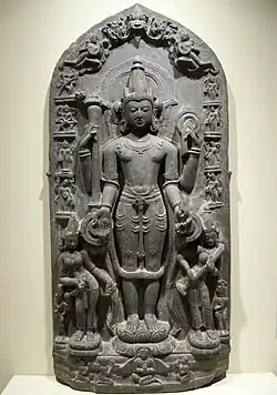 11th-century Vishnu sculpture the goddesses Lakshmi and Sarasvati. The edges show reliefs of Vishnu avatars Varaha, Narasimha, Balarama, Rama, and others. Also shown is Brahma. (Brooklyn Museum)[206]