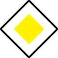 25a: Crossroad/sideroads road