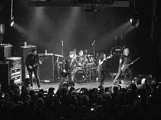 We Are the Fallen performing at Irving Plaza in New York City in 2010. Left to right: John LeCompt, Marty O'Brien, Rocky Gray, Carly Smithson, and Ben Moody.