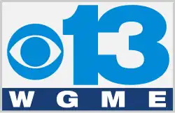 A light blue CBS eye next to a light blue sans serif numeral 13, with a blue box beneath and the widely spaced letters "W G M E" in white