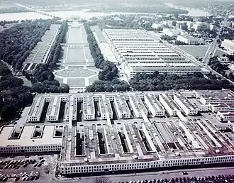 Image 10Westward view from the top of the Washington Monument in 1943 or 1944 during World War II. In the foreground, temporary buildings on the Washington Monument grounds house the Navy's Bureau of Ships. The Main Navy and Munitions Buildings stand to the right of the Lincoln Memorial Reflecting Pool. Temporary buildings to the left of the Reflecting Pool house the Navy's Bureau of Supplies and Accounts. (from National Mall)