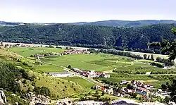 the town of Dürenstein lies in the floodplain of the Danube river. The river passes through the valley, between two sets of mountains on each side. The Russians emerged from the feldspar cliffs and defiles of the mountains, to attack the French column arrayed in the vineyards.
