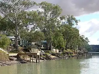 The Walker Flat shacks and boat landings as seen from the ferry (May 2009)