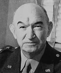 1942 black and white and neck photo of Major General Walter K. Wilson in uniform jacket and necktie