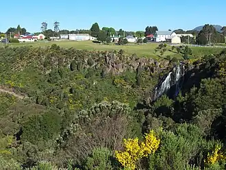 Waratah Falls in Waratah with part of the town in the background