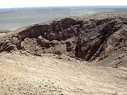 Hole in the hill top