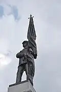 Detail of the standard bearer at the top