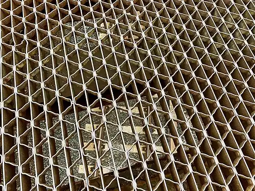 The original bridge's steel grate road deck