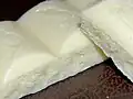 Because white chocolate contains no cocoa solids, it is classified as sugar confectionery instead of chocolate.[needs update]