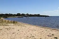 Looking west along the Lake Victoria shoreline towards the jetty