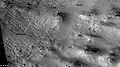 Channels and mantle, as seen by CTX camera (on Mars Reconnaissance Orbiter). Channels are exposed where the mantle has disappeared.