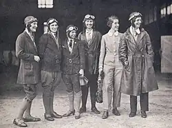 Women pilots who escorted the landing of Amy Johnson in Sydney on June 4, 1930, at the end of the first England to Australia flight by a woman. Photo presented to the National Library of Australia by Miss Meg Skelton (on left).
