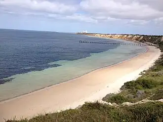 View of Wool Bay and jetty from the cliff top