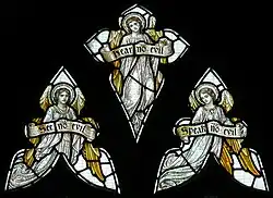 "Three Wise Angels". Detail of a window in St Peter's Church.
