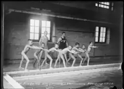A swim lesson in a YMCA in 1915