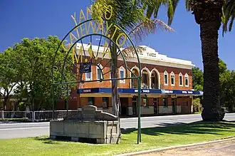 Yanco Hotel, welcome sign and a Bills horse trough