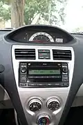 A simpler instrument cluster without tachometer for base model Belta and Yaris sedan