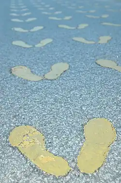 Yellow footprints outside of the Receiving Building, where prospective Marines receive their first taste of military life