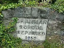 Stone marking the original site of Dolgellau Grammar School